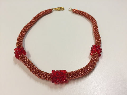 Dazzling Rouge necklace with gold clasp.jpg