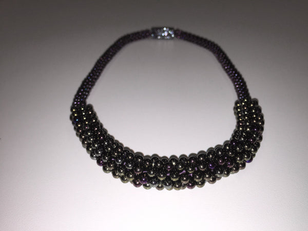 Beautiful hand-crafted necklace - deep bronze with purple & silver highlights