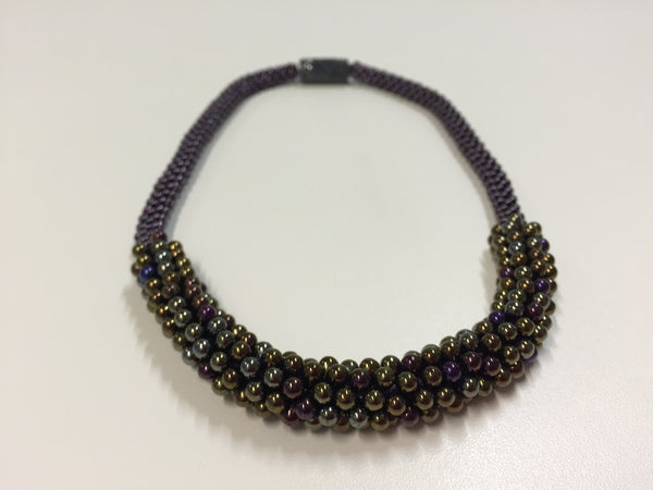 Beautiful hand-crafted necklace - deep bronze with purple & silver highlights